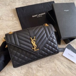Borsa per busta media YSL Saint Laurent Mix Matelasse nera in oro