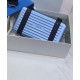 Replica Christian Dior e Rimowa Frizione personale in alluminio su cinturino blu Replica Christian Dior e Rimowa Frizione personale in alluminio su cinturino blu