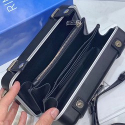 Christian Dior e Rimowa frizione personale in alluminio su cinturino nero