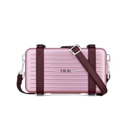 Christian Dior e Rimowa Clutch in alluminio con cinturino rosa