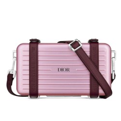 Christian Dior e Rimowa Clutch in alluminio con cinturino rosa