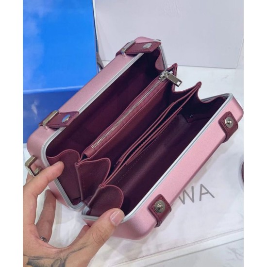 Replica Christian Dior e Rimowa Clutch in alluminio con cinturino rosa Replica Christian Dior e Rimowa Clutch in alluminio con cinturino rosa