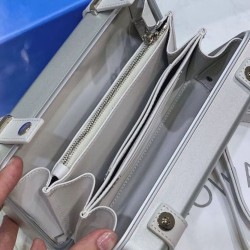 Christian Dior e Rimowa frizione personale in alluminio su cinturino argento