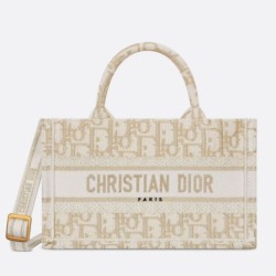 Borsa Dior Mini Book Tote con cinturino ricamato Dior Oblique color oro