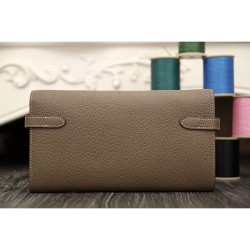 Hermes Kelly Longue Portafoglio in pelle étoupe Clemence